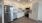 a kitchen with white cabinets